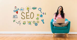 Picture of an SEO consultant sat in a chair with an imaginary thought bubble full of SEO terms and related icons