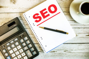 Picture of a notepad with SEO written in big red letters