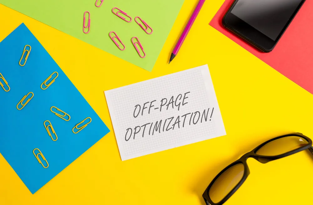 Off page seo written on a white piece of paper surrounded by colourful stationery